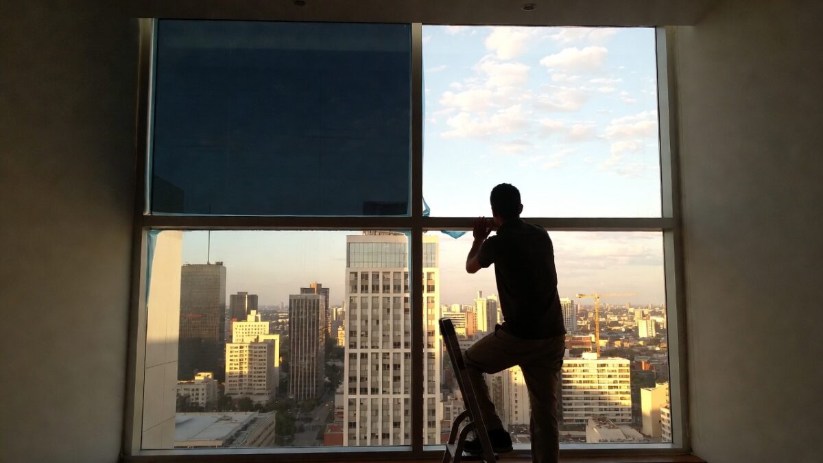 person-installing-window-film-image
